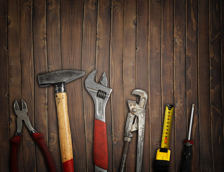 tools on wooden background