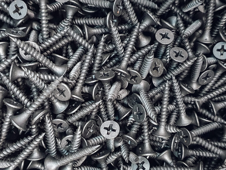 Screws. Black steel  screws for background